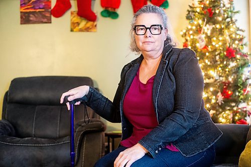 MIKAELA MACKENZIE / WINNIPEG FREE PRESS
	
Joanne Machado, who needs a hip replacement but was two weeks too late to get a surgery via the out-of-province task force (and is now facing a year wait), in her home on Friday, Dec. 22, 2023. For Katie story.
Winnipeg Free Press 2023