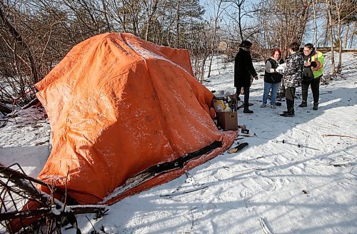 JOHN WOODS / WINNIPEG FREE PRESS
Mission Baptist Church volunteers Logan and Judy Anderson and Chris Puckett deliver Christmas meals to tent communities in Winnipeg Monday, December  25, 2023. 

Reporter: Malak