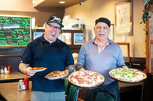 MIKAELA MACKENZIE / WINNIPEG FREE PRESS
	
One of the new owners Justin Scheffer (left) and founder John at Johnny's Maples Pizza on Friday, Dec. 22, 2023. For Dave story.
Winnipeg Free Press 2023