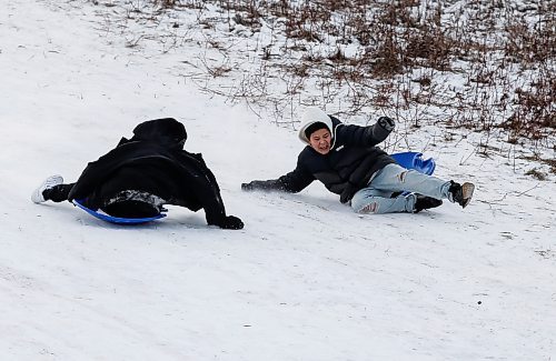 JOHN WOODS / WINNIPEG FREE PRESS
Brothers Dustin, right, and Jose slide down Garbage Hill at Westvew Park in Winnipeg Tuesday, December  26, 2023. 

Reporter: standup