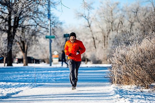 MIKAELA MACKENZIE / WINNIPEG FREE PRESS
	
Mike Szalai goes for a run among frosty trees in Assiniboine Park on Thursday, Dec. 28, 2023. Standup.
Winnipeg Free Press 2023