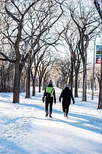 MIKAELA MACKENZIE / WINNIPEG FREE PRESS
	
Tracy Hoilett (left) and Carrie Schaepe walk among frosty trees in Assiniboine Park on Thursday, Dec. 28, 2023. Standup.
Winnipeg Free Press 2023