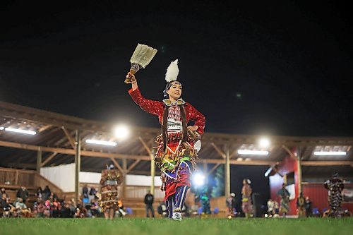 14072023
Helena Soto of Enoch Cree Nation dances in a jingle dance category at the Sioux Valley Dakota Nation Dakota Oyate Wacipi Powwow late Friday evening. 
(Tim Smith/The Brandon Sun)