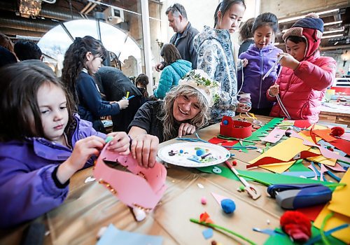 JOHN WOODS / WINNIPEG FREE PRESS
Sheena Rattai, Event Manager, does crafts with Reyna, 5, and other children at New Year&#x2019;s Day festivities at The Forks in Winnipeg Monday, January 1, 2024. 

Reporter: nicole