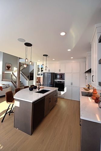 Todd Lewys / Winnipeg Free Press
Centred around a curved island, the kitchen is loaded with charm, style, and function.