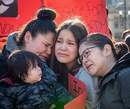 JESSICA LEE / WINNIPEG FREE PRESS

From left to right: Kori-Lynn Hardisty (sister of Linda Beardy), Nayea Beardy (niece of Linda Beardy) and Evelyn Beardy (auntie of Linda Beardy) hold each other and cry April 7, 2023 at Main and Portage during a rally to remember Linda Beardy&#x2019;s life. The rally ended with a march to police headquarters where protestors posted signs demanding justice for Beardy and other missing and murdered women and girls. Beardy&#x2019;s body was found earlier this week on Monday at the Brady Landfill.

Reporter: Erik Pindera