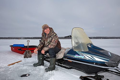 03012024
Roger Boulet of Brandon sits atop his 1994 Yamaha Bravo snowmobile while ice fishing at Pelican Lake with his daughter Genevieve Boulet (left) on a mild and overcast Wednesday. Genevieve lives in Quebec and is home to visit family. The Boulets also fished on the Souris River earlier in the week. 
(Tim Smith/The Brandon Sun)