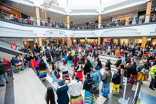 MIKAELA MACKENZIE / WINNIPEG FREE PRESS
	
The Soaring Eagle Singers lead a round dance at Polo Park during an event marking the second annual National Ribbon Skirt Day on Thursday, Jan. 4, 2024.  Standup.
Winnipeg Free Press 2023