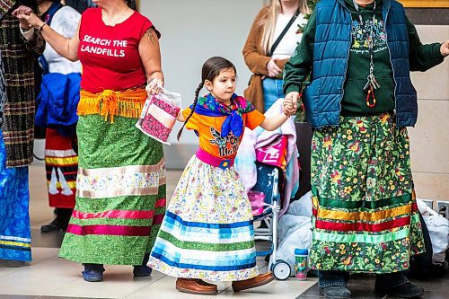 MIKAELA MACKENZIE / WINNIPEG FREE PRESS
	
Zoe Nanowin, six, round dances at Polo Park during an event marking the second annual National Ribbon Skirt Day on Thursday, Jan. 4, 2024.  Standup.
Winnipeg Free Press 2023