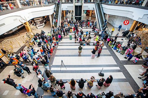 MIKAELA MACKENZIE / WINNIPEG FREE PRESS
	
The Soaring Eagle Singers lead a round dance at Polo Park during an event marking the second annual National Ribbon Skirt Day on Thursday, Jan. 4, 2024.  Standup.
Winnipeg Free Press 2023