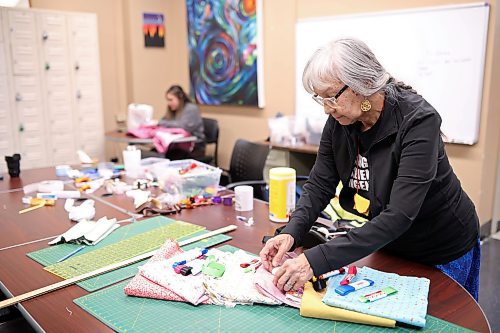 04012024
Brandon University Anishinaabe Knowledge Keeper Barb Blind organizes fabric and ribbons at the BU Indigenous Peoples&#x2019; Centre on Ribbon Skirt Day, Thursday. According to Blind, who has sewn traditional skirts since the mid 1990&#x2019;s, the skirts represent the power of Indigenous women and their connection to the earth. Ribbon Skirt Day is honoured on January 4th and the BU Indigenous Peoples&#x2019; Centre will be hosting ribbon skirt making workshops each Thursday throughout the month from 10:00 AM until early afternoon.  (Tim Smith/The Brandon Sun)