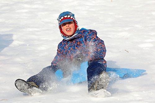 04012024
Emery Hamel kicks up snow while sledding down the hill at Victoria Park in Souris during an outing for kids at Souris Cooperative Daycare on Thursday. (Tim Smith/The Brandon Sun)