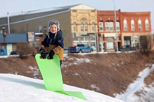 04012024
Jackson Wall pauses while hiking up the hill during a sledding outing at Victoria Park in Souris with other kids from Souris Cooperative Daycare on Thursday. (Tim Smith/The Brandon Sun)