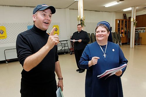 TREVOR HAGAN / WINNIPEG FREE PRESS - Director/Composer, Danny Schur, gives instructions to Sister Janet Kozak as Father Mark Gnutel looks on. 10-09-27