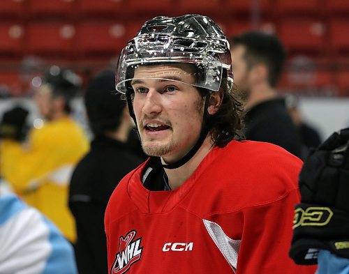 Former Brandon Wheat King Lynden McCallum, 23, watches the action at practice on Friday afternoon while wearing a silver helmet from his time with the American Hockey League’s Henderson Silver Knights. (Photo Perry Bergson/The Brandon Sun)