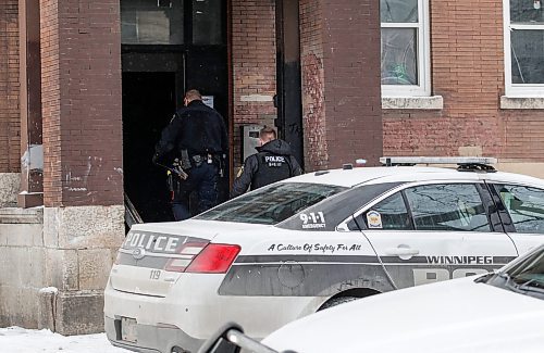 JOHN WOODS / WINNIPEG FREE PRESS
Police investigate at 583 Furby after raiding 575 Furby in Winnipeg Sunday, January 7, 2024. 

Reporter: tyler