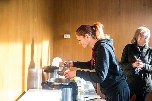 MIKAELA MACKENZIE / WINNIPEG FREE PRESS
	
Samantha ladles out some homemade soup into a cup at the cold weather pop-up shelter run by St. Boniface Street Links at 604 St. Mary&#x573; Road on Tuesday, Jan. 9, 2024. For Nicole Buffie story.
Winnipeg Free Press 2023