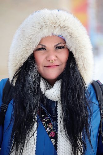 09012024
Jennifer Clyne keeps warm under a thick hood while walking along Rosser Avenue in downtown Brandon on a bitterly cold Tuesday.
(Tim Smith/The Brandon Sun)