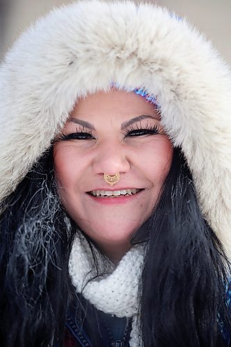 09012024
Jennifer Clyne keeps warm under a thick hood while walking along Rosser Avenue in downtown Brandon on a bitterly cold Tuesday.
(Tim Smith/The Brandon Sun)