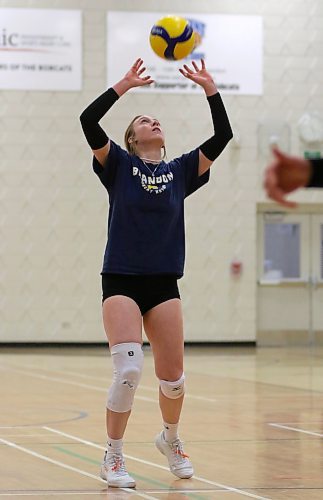 Carly Thomson sets during Brandon University women's volleyball practice on Wednesday. (Thomas Friesen/The Brandon Sun)