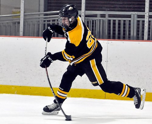 Senior Tarek Lapointe is captain of the Neepewa Tigers. The power forward rips a shot towards the Vincent Massey net during a Dec. 20 game won 5-3 by the Vikings. He's 13th in league scoring with 17 goals and 32 points in 16 games. (Jules Xavier/The Brandon Sun)
