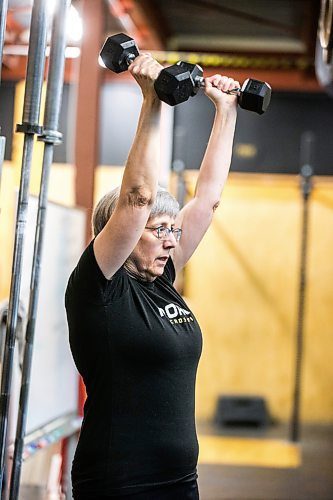 MIKAELA MACKENZIE / WINNIPEG FREE PRESS
	
Yvonne Morier uses the dumbbells at Norak Crossfit on Wednesday, Jan. 10, 2024. Morier has been lifting weights since she retired, and has noticed a real difference in her strength, stamina, and endurance. For AV Kitching story.
Winnipeg Free Press 2023