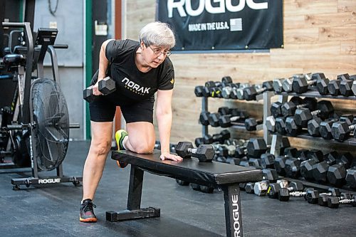 MIKAELA MACKENZIE / WINNIPEG FREE PRESS
	
Yvonne Morier uses the dumbbells at Norak Crossfit on Wednesday, Jan. 10, 2024. Morier has been lifting weights since she retired, and has noticed a real difference in her strength, stamina, and endurance. For AV Kitching story.
Winnipeg Free Press 2023