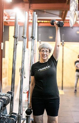 MIKAELA MACKENZIE / WINNIPEG FREE PRESS
	
Yvonne Morier uses the dumbbells at Norak Crossfit on Wednesday, Jan. 10, 2024. Morier has been lifting weights since she retired, and has noticed a real difference in her strength, stamina, and endurance. For AV Kitching story.
Winnipeg Free Press 2023