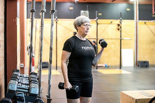 MIKAELA MACKENZIE / WINNIPEG FREE PRESS
	
Yvonne Morier uses the dumbbells at Norak Crossfit on Wednesday, Jan. 10, 2024. Morier has been lifting weights since she retired, and has noticed a real difference in her strength, stamina, and endurance. For AV Kitching story.
Winnipeg Free Press 2023