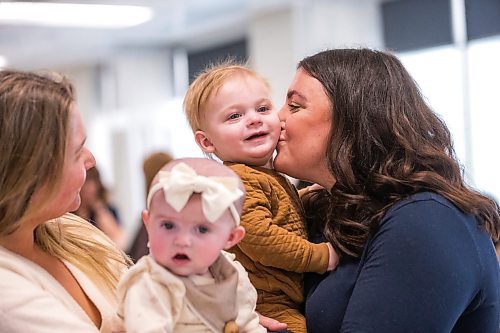 MIKAELA MACKENZIE / WINNIPEG FREE PRESS
	
Bri Sa kisses her son, Archie Sa (13 months), at Heartland Fertility on Thursday, Jan. 11, 2024. For AV story.
Winnipeg Free Press 2023