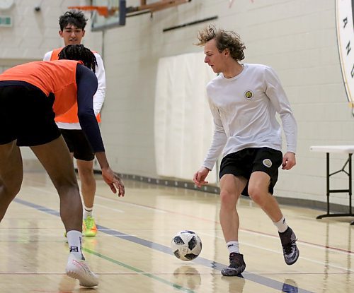 Bryson Haywood, right, and the Brandon University Bobcats men's futsal team begin their MCAC title defence on Sunday in Niverville, with two games to open the eight-match season. (Thomas Friesen/The Brandon Sun)