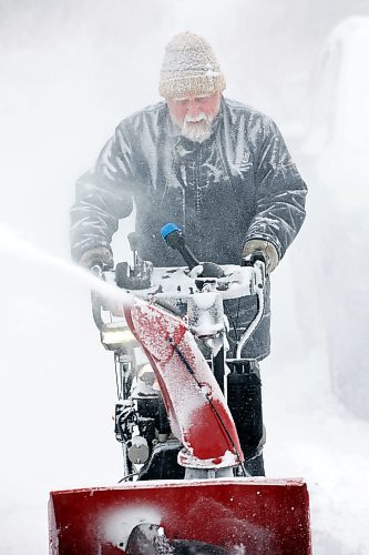 11012024
Doug Brolund is covered in frost and snow while using a snowblower to clear snow in Brandon&#x2019;s east end near Rideau Park on a cold Thursday after a snowstorm blanketed the wheat city. 
(Tim Smith/The Brandon Sun)