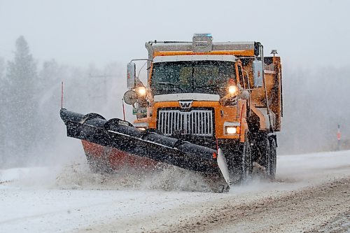A plow clears fresh snow from Highway 10 south of Onanole during a snowstorm on Wednesday. (Tim Smith/The Brandon Sun)