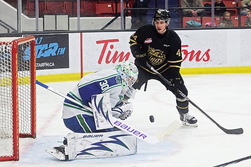 12012024
Netminder Reid Dyck #30 of the Swift Current Broncos deflects a shot on net as Andrei Maliavin #44 of the Brandon Wheat Kings looks on during WHL action at Westoba Place on Friday evening.  (Tim Smith/The Brandon Sun)