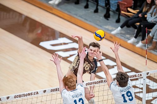 BROOK JOJNES / WINNIPEG FREE PRESS
The University of Manitoba Bisons hosts the visiting Trinity Western Spartans in Canada West men's volleyball action inside Investors Group Athletic Centre at the University of Manitoba's Fort Garry campus in Winnipeg, Man., Friday, Jan. 12, 2023. The Spartans earned a 3-1 (27-25, 25-21, 15-25, 25-23) victory over the Bisons. Pictured: U of M Bisons left side Spencer Grahame spikes the volleyball during fourth set action.