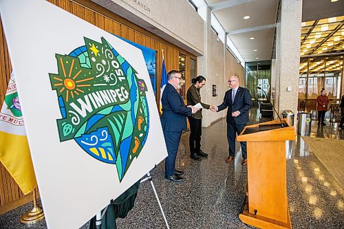 MIKAELA MACKENZIE / WINNIPEG FREE PRESS
	
Mayor Scott Gillingham and Jordan Stranger shake hands after revealing the Winnipeg 150 graphic at City Hall on Monday, Jan. 15, 2024. For Tyler story.
Winnipeg Free Press 2023