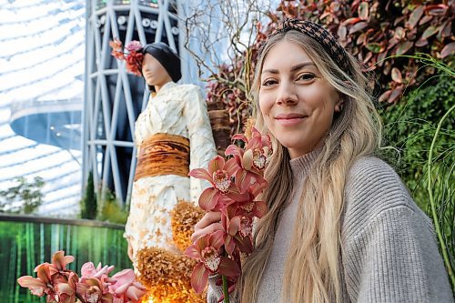 RUTH BONNEVILLE / WINNIPEG FREE PRESS

ENT - Fleurs de Villes VOYAGE 

Britney Fache floral designer and owner of  Fache Florals, has created a kimono using plant material. Her display is one of 15 one-of-a-kind floral mannequins inspired by global travel destinations and created by local florists using fresh flowers and other natural plant material. 

Photos of Britney Fache as she spruces up her display Tuesday. 

Story: Fleurs de Villes VOYAGE at The Leaf. Fleurs de Villes VOYAGE  is a travel-themed floral showcase on display at The Leaf in Assiniboine Park from Jan 11 - 21st.

 
Jan 16th, 2024