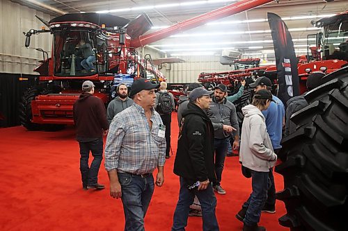 16012024
Visitors to the opening day of Manitoba Ag Days 2024 check out farm equipment at the Keystone Centre on Tuesday.
(Tim Smith/The Brandon Sun)