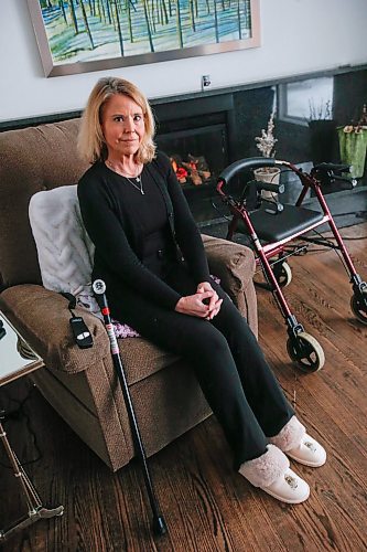 JOHN WOODS / WINNIPEG FREE PRESS
Cynthia Carr is photographed with her walker and cane in her home in Winnipeg Monday, January 16, 2024. Carr had a hip replaced on December 28/23 after a year of unrelenting pain. 

Reporter: ?