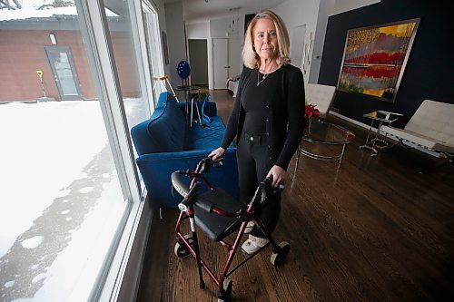 JOHN WOODS / WINNIPEG FREE PRESS
Cynthia Carr is photographed with her walker and cane in her home in Winnipeg Monday, January 16, 2024. Carr had a hip replaced on December 28/23 after a year of unrelenting pain. 

Reporter: ?