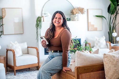 MIKAELA MACKENZIE / WINNIPEG FREE PRESS
	
Heather Barnes, who quit her teaching position for her successful DIY instagram channel, in her home (she built the living room fireplace seen behind her) on Wednesday, Jan. 17, 2024. 
Winnipeg Free Press 2024