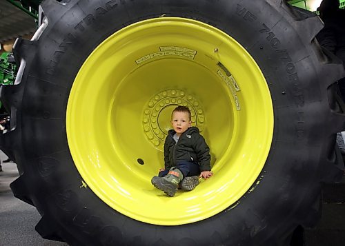 17012024
Two-year-old Austin Hird of Killarney explores the wheel well of a combine during Manitoba Ag Days 2024 at the Keystone Centre on Wednesday.
(Tim Smith/The Brandon Sun)