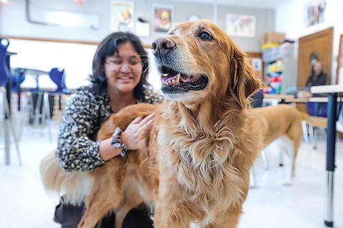 RUTH BONNEVILLE / WINNIPEG FREE PRESS

LOCAL - therapy dogs

Photo of grade 9 student, Kat Aseron, all smiles as she pets Daisy, at St. James Collegiate Wednesday.

SCHOOL THERAPY DOGS: Ahead of exam season, St. James Collegiate recruited a new therapist to ease student anxieties. Meet Daisy: a canine trained in supporting students and staff with stress and behaviour challenges. Daisy is the division's newest addition to its therapy-dog-in-residence program. She joins a beloved retriever named Charlie. We're stopping by the school to see Daisy and Charlie in action. 

Subject: Students with therapy dogs Daisy (new addition) and Charlie 
Reporter - Maggie 

Jan 17th, 2024