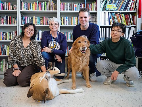 RUTH BONNEVILLE / WINNIPEG FREE PRESS

LOCAL - therapy dogs

Photo of grade 9 students, Kat Aseron (left) and Aldrin Javier (far right) hanging out with Daisy, left and Charlie (retriever), with Daisy's owner, Robyn King (school secretary) and Geret Coates (Enflish teacher), owner of Charlie the retriever, at St. James Collegiate Wednesday.

SCHOOL THERAPY DOGS: Ahead of exam season, St. James Collegiate recruited a new therapist to ease student anxieties. Meet Daisy: a canine trained in supporting students and staff with stress and behaviour challenges. Daisy is the division's newest addition to its therapy-dog-in-residence program. She joins a beloved retriever named Charlie. We're stopping by the school to see Daisy and Charlie in action. 

Subject: Students with therapy dogs Daisy (new addition) and Charlie 
Reporter - Maggie 

Jan 17th, 2024