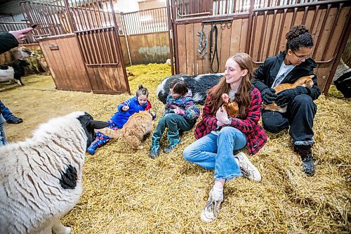 MIKAELA MACKENZIE / WINNIPEG FREE PRESS
	
Vegan kids Harley Tonge (eight, left), Hale Tonge (five), Jessica Walker (18), and Fynn Solar (12) at the Little Red Barn Sanctuary on Thursday, Jan. 18, 2024. For green page story.
Winnipeg Free Press 2024