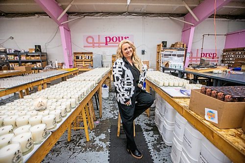 MIKAELA MACKENZIE / WINNIPEG FREE PRESS
	
Amanda Buhse at the Coal and Canary Candle Company warehouse on Friday, Jan. 19, 2024. She turned this candle making side hustle into her main business, and quit her job as a graphic designer. For AV story.
Winnipeg Free Press 2024