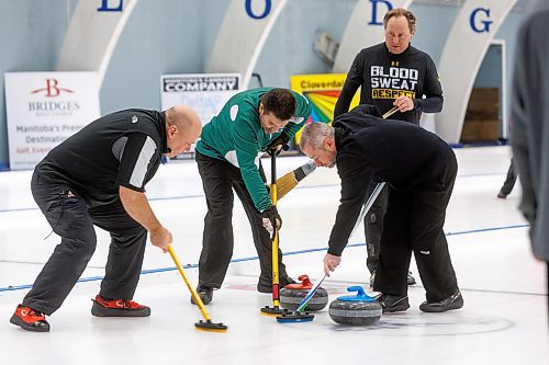 MIKE DEAL / WINNIPEG FREE PRESS
Chad Gardiner watches as teammates (l-r) John Batiuk, Shawn Atamanchuk, and Steve Erickson, sweep his rock over the hog line towards the house during the Manitoba Open Bonspiel at the Deer Lodge Curling Club Friday afternoon.
240119 - Friday, January 19, 2024.