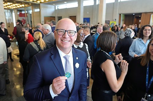 RUTH BONNEVILLE / WINNIPEG FREE PRESS

Local Standup - Wpg's 150th Bday

Mayor Scott Gillingham has the150th graphic commemorative pin created by artist, Jordan Stranger, placed on his lapel at the event.  

Mayor Scott Gillingham along with many other leaders and guests marked Winnipeg's  150th anniversary of Winnipeg City Council&#x573; first council meeting in 1874 at City Hall Friday.  Mayor Gillingham and Premier Wab Kinew stood in front of a life-size, lit &quot;150&quot; sign outside the chamber before heading upstairs for the formal presentation with speeches by leaders and luncheon.  


Jan 19th, 2024