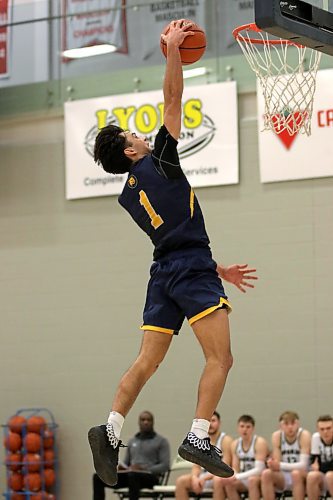 Brandon University guard Travis Hamberger throws down a dunk during a 78-71 victory facing the Saskatchewan Huskies to sweep their Canada West men's basketball weekend at the Healthy Living Centre on Saturday. (Thomas Friesen/The Brandon Sun)