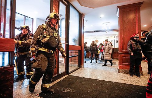 JOHN WOODS / WINNIPEG FREE PRESS
Firefighters were called for a smell of gas as people gather in the lobby of the Marlborough Hotel to rally in support of a woman who was allegedly detained by security and handcuffed with a zip lock at the hotel in Winnipeg Sunday, January  21, 2024. A video was posted to social media which allegedly shows the incident.

Reporter: tyler